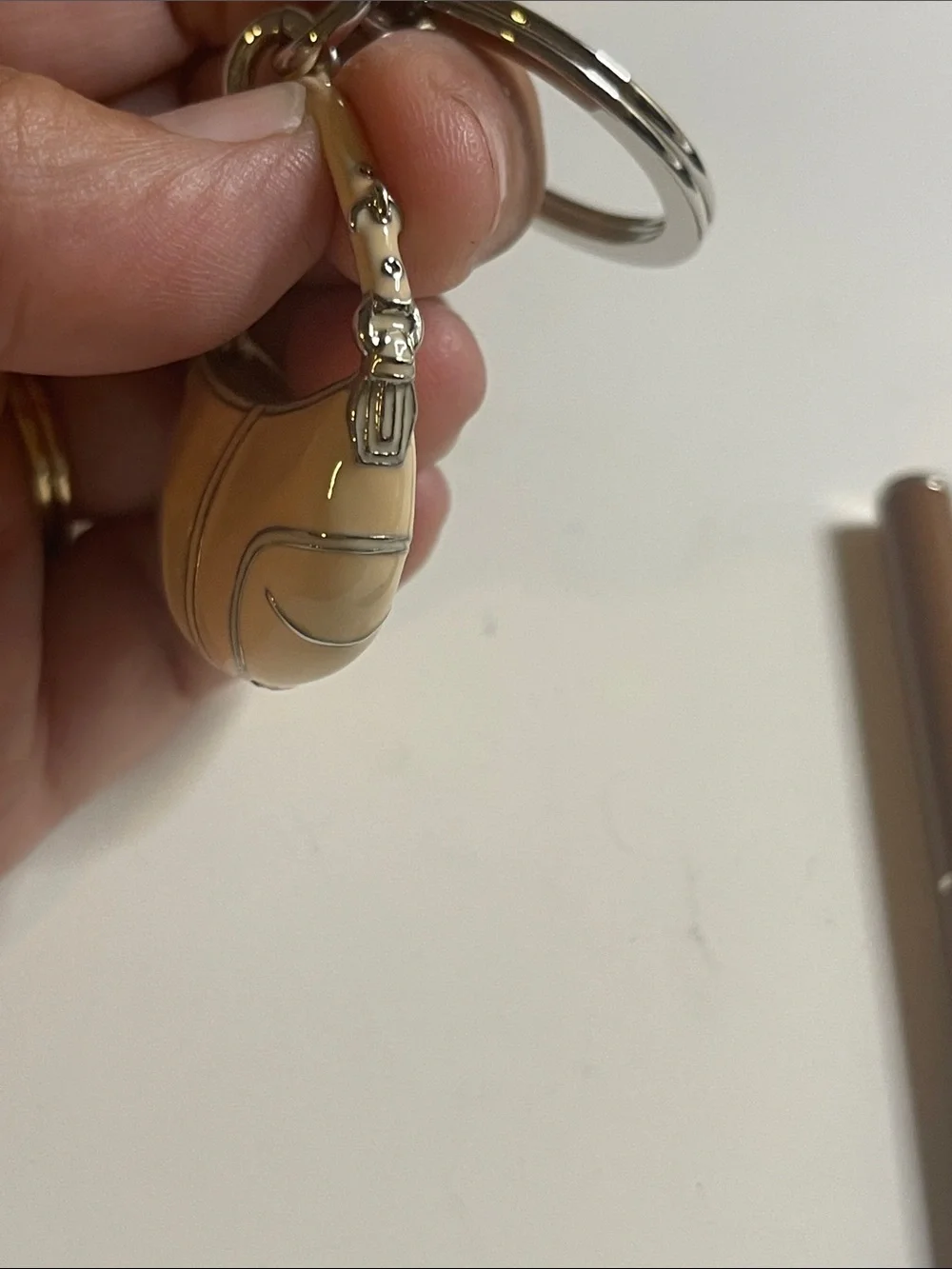 Coach Beige Enamel Handbag Keychain and Coach Pen